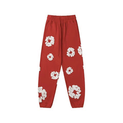 Denim Tears Cotton Wreath Graphic Sweatpants - Red / Relaxed Streetwear Fit