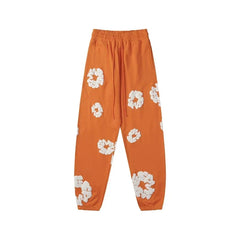 Denim Tears Cotton Wreath Graphic Sweatpants - Orange / Relaxed Streetwear Fit