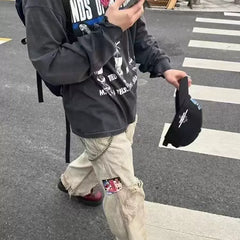 ERD's melancholic rich second generation doing old, destroying, mud dyeing, comic stickers, Kaha, American style logging, warehouse workwear, striped pants
